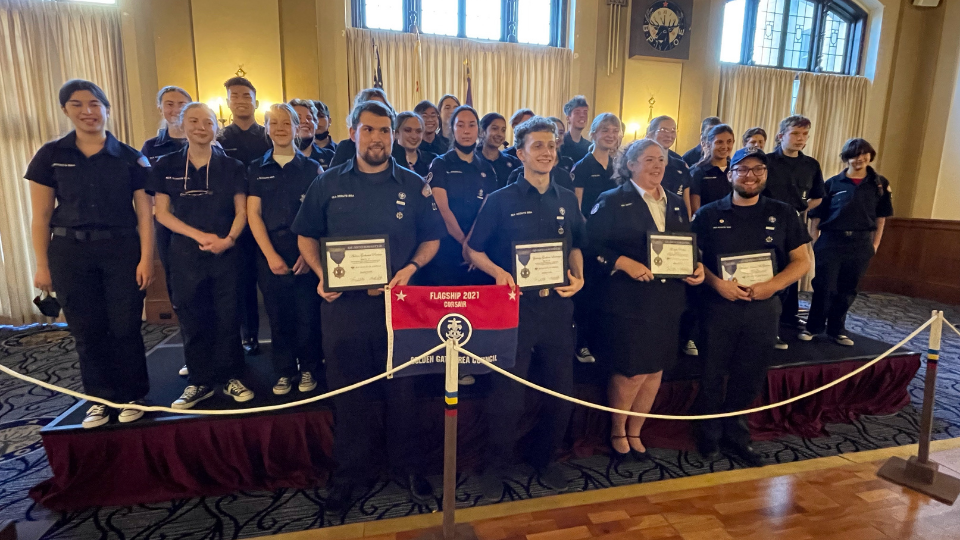 Recognizing four new quartermasters with their ship's crews behind them.